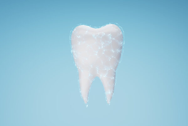 Teeth with electric spark on blue background metaphor sensitive teeth treatment and prevention. 3D rendering.
